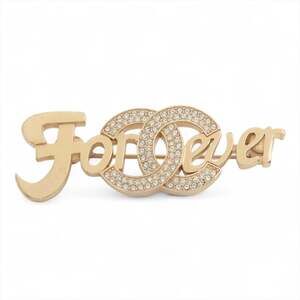 CHANEL Gold Logo Brooch